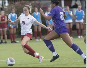  ?? (NWA Democrat-Gazette/J.T. Wampler) ?? Anna Podojil (left) of Arkansas had a goal and an assist in Sunday’s 3-2 victory over Grand Canyon.