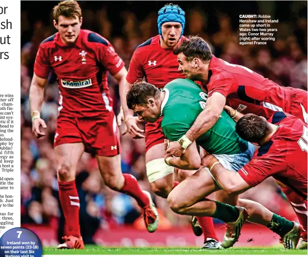  ??  ?? CAUGHT: Robbie Henshaw and Ireland came up short in Wales two two years ago; Conor Murray (right) after scoring against France