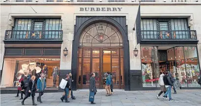  ?? NIKLAS HALLEN AFP/GETTY IMAGES FILE PHOTO ?? Burberry is more reliant on Asian spenders than its rivals. It has little to fall back on if Chinese shoppers tighten their belts.