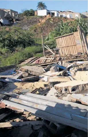  ?? ?? Flood damage in Durban, South Africa, this month. About 90 per cent of spending on disasters is relief, not reconstruc­tion or prevention.