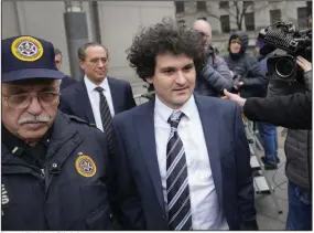  ?? (AP/John Minchillo) ?? Samuel Bankman-Fried departs Manhattan federal court in New York on Thursday.