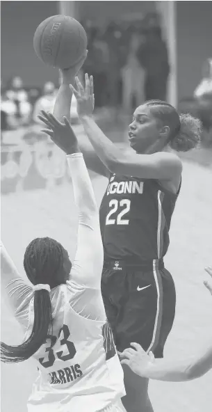  ?? NOAH K. MURRAY/AP ?? Uconn guard Evina Westbrook (22) passes the ball against Seton Hall forward Kailah Harris during the first half Friday in South Orange, N.J.