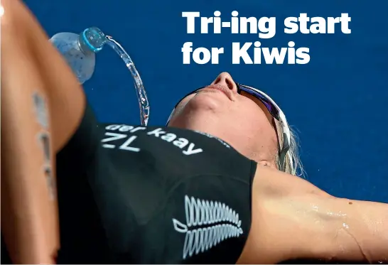  ?? PHOTOS: GETTY IMAGES/PHOTOSPORT ?? Nicole van der Kaay shows the strain of her seventh-placed finish in the triathlon at the Commonweal­th Games. She was the best of the Kiwi women.