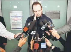  ??  ?? Boyle speaks to the media after arriving with his wife and three children at Toronto Pearson Internatio­nal Airport. — Reuters photo