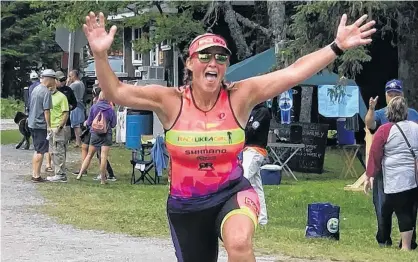  ?? SUBMITTED PHOTO ?? Michelle Brenton at the finish line of the Harvey Triathlon in New Brunswick in August.
