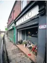  ??  ?? ●Tributes outside the shop in Stockport Road