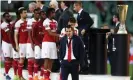  ?? Photograph: Alex Grimm/Getty Images ?? Unai Emery walks away from the Europa League trophy after Arsenal’s defeat by Chelsea in the final in Baku last season.