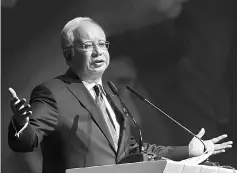  ??  ?? Najib delivering his keynote address at the 2017 Global Transforma­tion Forum in Kuala Lumpur yesterday. — Bernama photo