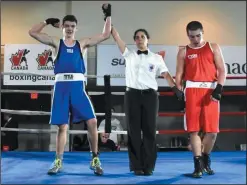  ?? SUBMITTED PHOTO ?? Janick Lacroix of the Medicine Hat Boxing Club is announced the winner in his junior national semifinal over B.C.’s Elias Martinez Friday in Edmonton.