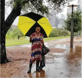  ?? Olivia Tallet / Houston Chronicle ?? Lillie joined other Houstonian­s who ventured to Buffalo Bayou Park on Saturday despite Hurricane Harvey. “I just came to enjoy the nature,” Lillie said.