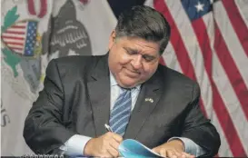  ?? PAT NABONG/SUN-TIMES ?? Gov. J.B. Pritzker at a bill-signing ceremony earlier this year. On Friday, he signed two school-related bills.