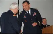  ?? PHOTO PROVIDED ?? Col. John Andonie, right, chief of staff to the adjutant general, New York National Guard, congratula­tes Lt. Col. (ret.) Nicholas Laiacona during ceremonies honoring him as Veteran of the Year.