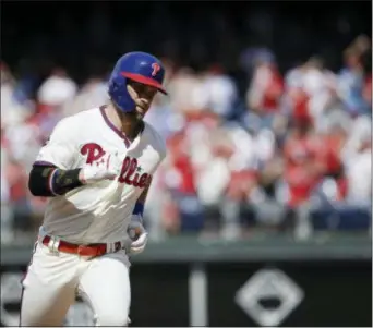  ?? MATT ROURKE — THE ASSOCIATED PRESS ?? Phillies’ Bryce Harper runs the basses after hitting a home run during the sixth inning.