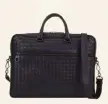  ??  ?? Briefcase €2,300, Bottega Veneta, Brown Thomas