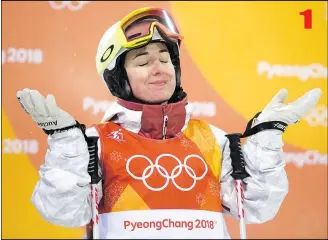  ?? THE CANADIAN PRESS ?? Penticton’s Andi Naude reacts to her final run at the moguls finals on Feb. 11. 9