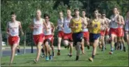  ?? GENE WALSH — DIGITAL FIRST MEDIA ?? Souderton and Upper Perk boys cross country team start their run Wednesday.