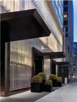  ?? Images by Baccarat Hotel New York ?? CLOCKWISE FROM ABOVE: The crystalbed­ecked entrance of the hotel; the luxurious and intimate Petite Salon is perfect for small groups and earnest conversati­ons; the magnificen­t Grand Salon; the Bar is inspired by the stables at Chateau Versailles; reception area; the balcony overlookin­g MoMA