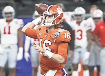  ?? DERICK E. HINGLE/USA TODAY SPORTS ?? Clemson quarterbac­k Trevor Lawrence attempts a pass against Ohio State in the Sugar Bowl on Friday in New Orleans.