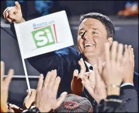  ?? AP ?? Italian Premier Matteo Renzi addresses the crowd during a rally on the upcoming Italian constituti­onal referendum in Florence Friday.