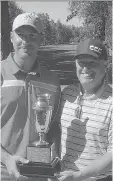  ??  ?? Scotia Wealth Open champ Paul Raycroft, left, gets his trophy from tournament organizer Dean Prosky.