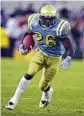 ?? ASSOCIATED PRESS ?? DeShaun Foster piled up 44 TDs and 3,194 rushing yards for UCLA from 1998-2001.