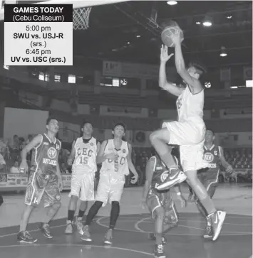  ?? CYRIL CAMPOREDON­DO ?? Marc Obado of the CEC Dragons goes for a twinner during their match against the UV Baby Lancers in the second round of semis in the 13th CESAFI basketball season last night at the Cebu Coliseum. The Baby Lancers won, 79-59.