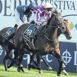  ??  ?? Wings Of Eagles on the way to a shock victory in the Investec Derby at Epsom on Saturday.