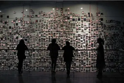  ??  ?? Photograph­s of Chileans who were executed under Pinochet’s military dictatorsh­ip, at the Museum of Memory and Human Rights in Santiago, which opened in 2010