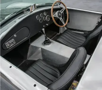  ??  ?? Left: Minimalist interior to Cobra-correct standards