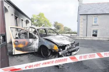  ?? PRESSEYE ?? The property on the Brustin Brae Road in Larne where shots were fired after a vehicle was set on fire