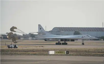  ?? Picture: Jacques Nelles ?? TOUCHDOWN. The Russian Tupolev Tu-160 Blackjack bomber deploys its parachutes as it lands at Air Force Base Waterkloof yesterday.