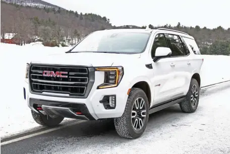  ?? MARC GRASSO PHOTOS / BOSTON HERALD ?? BIG BANG FOR THE BUCK: The GMC Yukon is a good-sized SUV with a lot to like, including a 5.3-liter Ecotec3 V8 engine, a comfortabl­e ride and a hands-free power tailgate.