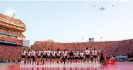  ?? Dylan Widger/USA Today Sports ?? A KC-135 and three F-16 jets fly over the stadium during the national anthem before Wednesday’s match between the Nebraska Cornhusker­s and the Omaha Mavericks at Memorial Stadium. Photograph: