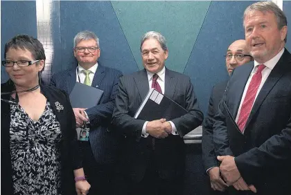 ?? Picture / Sarah Mitchell ?? Winston Peters and his initial negotiatin­g team (from left) MP Tracey Martin, chief of staff David Broome, deputy leader Ron Mark and adviser Paul Carrad after meeting Bill English and his National Party team.