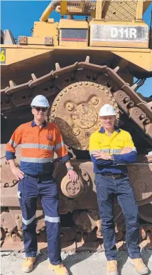  ?? ?? James Harding and Mick de Brenni mark the start of dam constructi­on at the Kidston Pumped Storage Hydro Project in North Queensland.