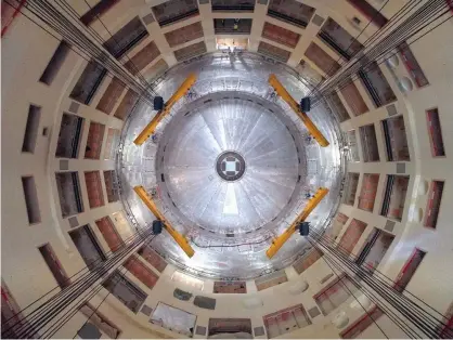  ?? Photograph: EJF Riche/Iter ?? The first piece of the Iter tokamak being lowered into place. The entire reactor will weight 23,000 tonnes.