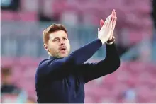  ?? Reuters ?? Tottenham manager Mauricio Pochettino applauds their fans after the 1-1 draw against Barcelona.