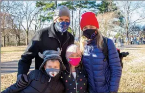  ??  ?? Zac and Paige Cook with their children Max and Isabella at St. Joseph Center