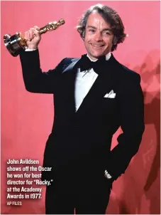  ?? AP FILES ?? John Avildsen shows off the Oscar he won for best director for “Rocky,” at the Academy Awards in 1977.