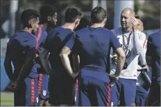  ?? ASSOCIATED PRESS ?? IN THIS JAN. 8, FILE PHOTO, Gregg Berhalter (right) head coach of the U.S. Men’s National Soccer team, instructs some of his players during drills in Bradenton, Fla.