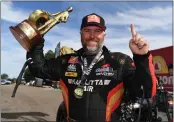  ?? PHOTO COURTESY OF NHRA ?? Shawn Langdon celebrates after winning the NHRA Gatornatio­nals on March 10in Gainesvill­e, Fla.