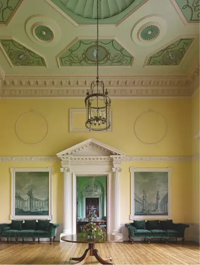  ??  ?? The east hall stands between the dining room and Drawing Room. Its Classical landscapes in grisaille, probably covered over in the 1830s, and the ceiling have been revealed again and elements of missing plasterwor­k reinstated during the recent...