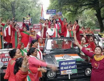  ?? — ASIAN AGE ?? Members of All- India Mahila Congress at a demonstrat­ion to demand passage of women reservatio­n bill in New Delhi on Monday.