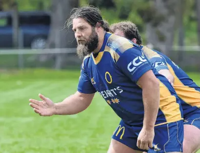  ?? PHOTO: GREGOR RICHARDSON ?? Hand out . . . Otago prop Josh Hohneck gets ready to receive a pass with front row partner Liam Coltman (obscured) in behind at training at Logan Park this week.