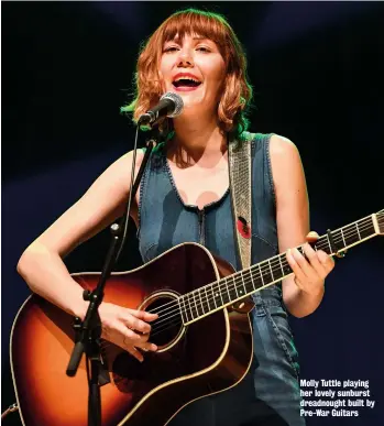  ?? ?? Molly Tuttle playing her lovely sunburst dreadnough­t built by Pre-War Guitars