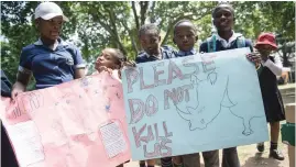  ?? Picture: Michel Bega ?? WE CARE. Pupils from Zenzeleni Primary School in Alexandra demonstrat­e at the Joburg Zoo on World Rhino Day, yesterday, calling on the world to save the rhino. Over 900 pupils marched.