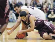  ?? Jean Levac/ottawa citizen ?? Philip Scrubb, at top, of the Carleton Ravens battles against Mehdi Tihani of the University of Ottawa Gee-Gees during first half action at Carleton University on Friday.