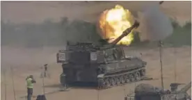  ?? —AP ?? PAJU: In this photo, South Korean army’s K-55 self-propelled howitzer fires during the annual exercise in Paju, near the border with North Korea, South Korea.