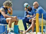  ?? — AFP ?? A file photo of Lasith Malinga (left), Upul Tharanga (centre) and Sanath Jayasuriya.