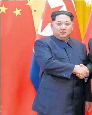  ??  ?? Kim Jong Un (left) was said to have called for “strategic, tactical co-operation” during his meeting with Xi Jinping.